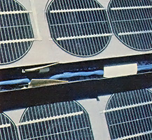 
A close-up view of one roof panel shows the four-inch photovoltaic cells in detail.

